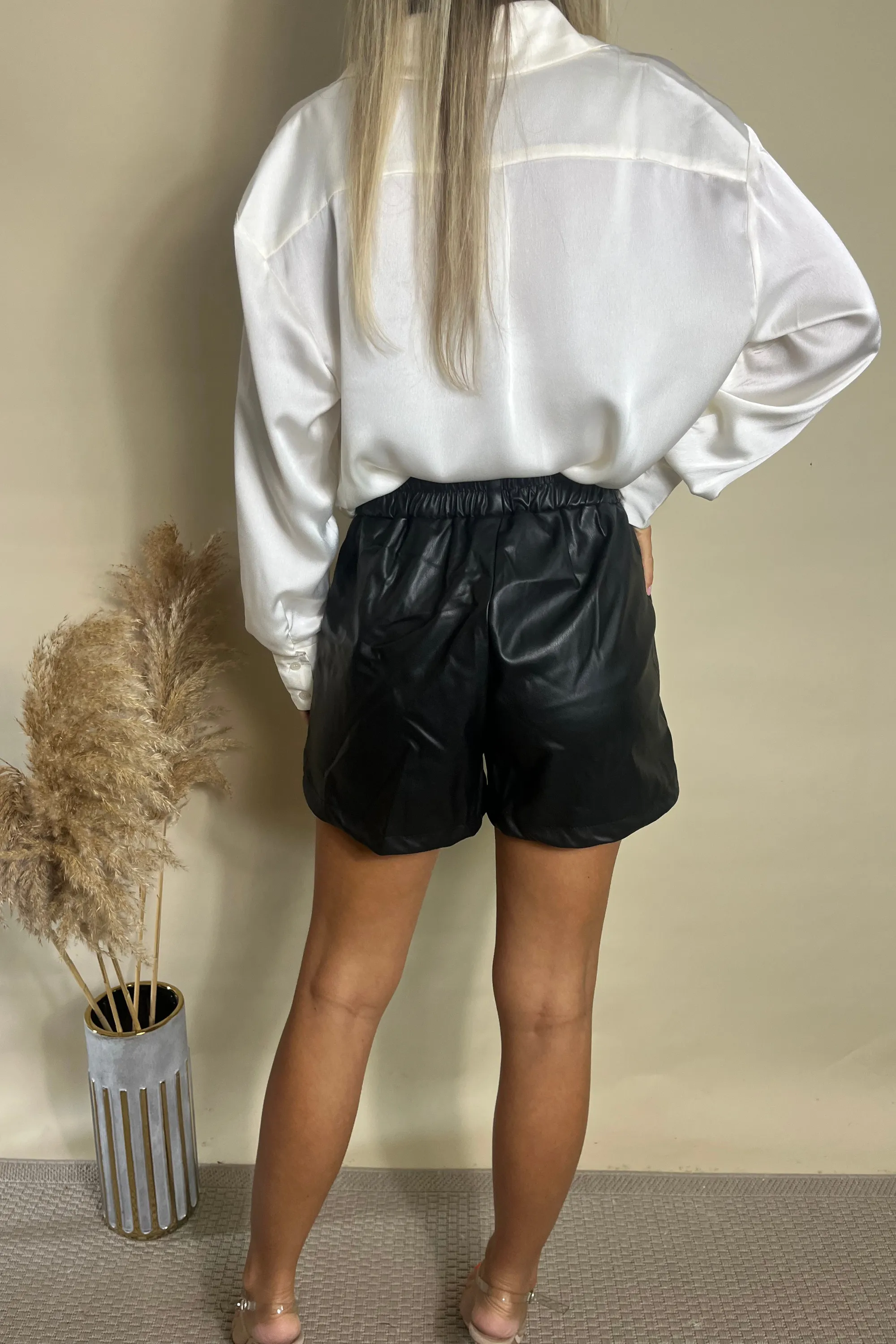 BLACK FAUX LEATHER RUNNER SHORTS