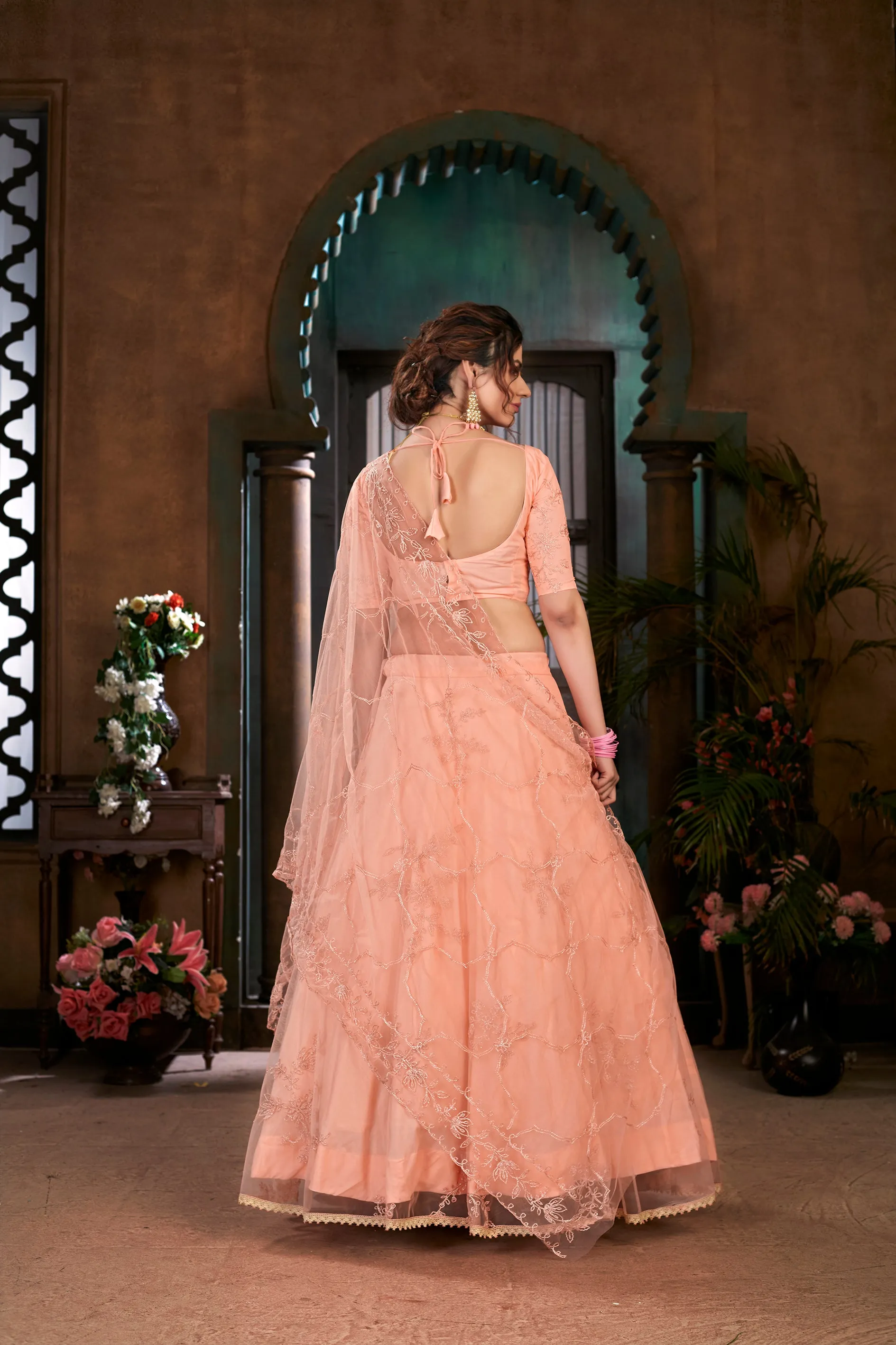 Peach Thread Embroidered Net Wedding Wear Lehenga Choli