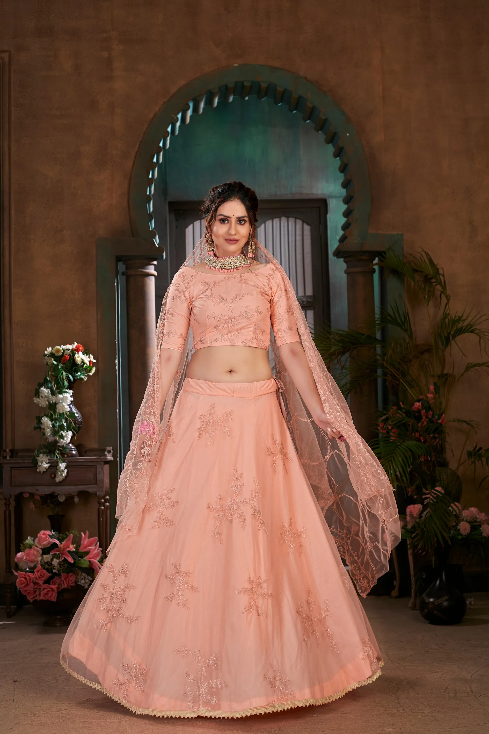 Peach Thread Embroidered Net Wedding Wear Lehenga Choli