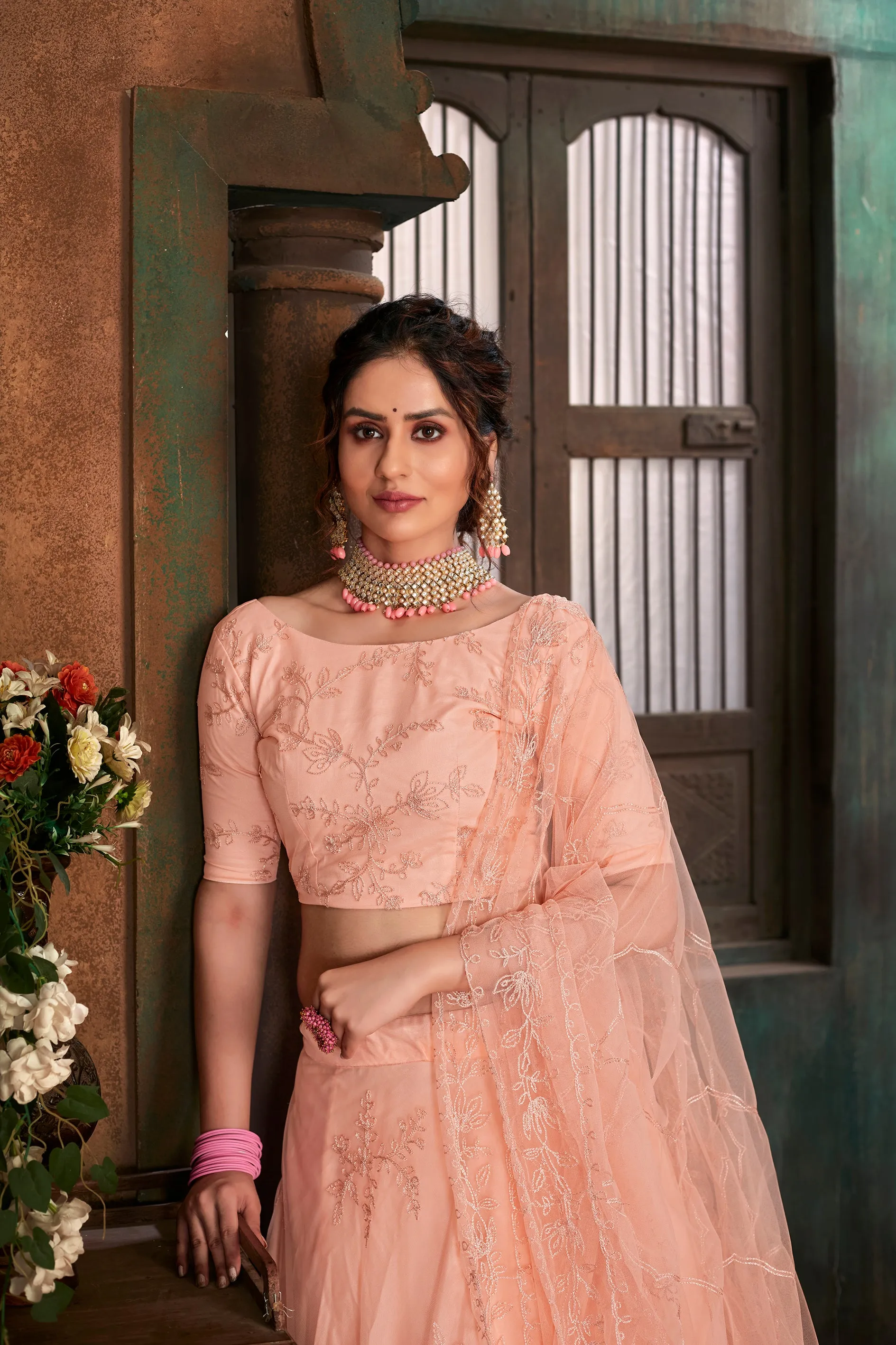 Peach Thread Embroidered Net Wedding Wear Lehenga Choli