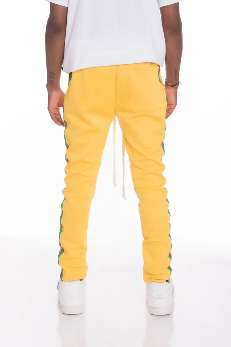 RASTA TRACK PANTS