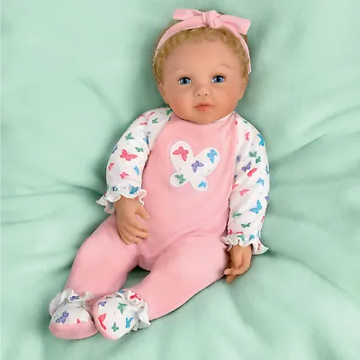 The Ashton - Drake Galleries Mommy's Girl Holiday Edition Baby Doll With 2 Outfits Lifelike & Poseable RealTouch® Vinyl Skin, Hand Rooted Hair & Cuddly Beanbag Body Girl Doll by Ping Lau 17-inches