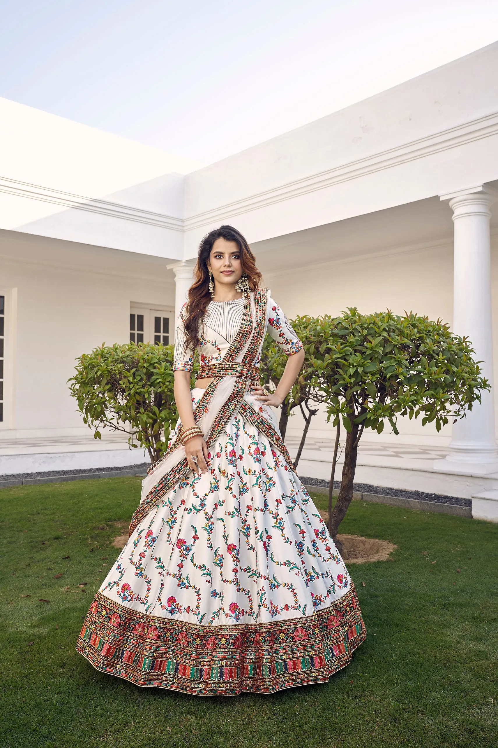 White Silk Embroidered Bridal Reception Heavy Border Lehenga Choli